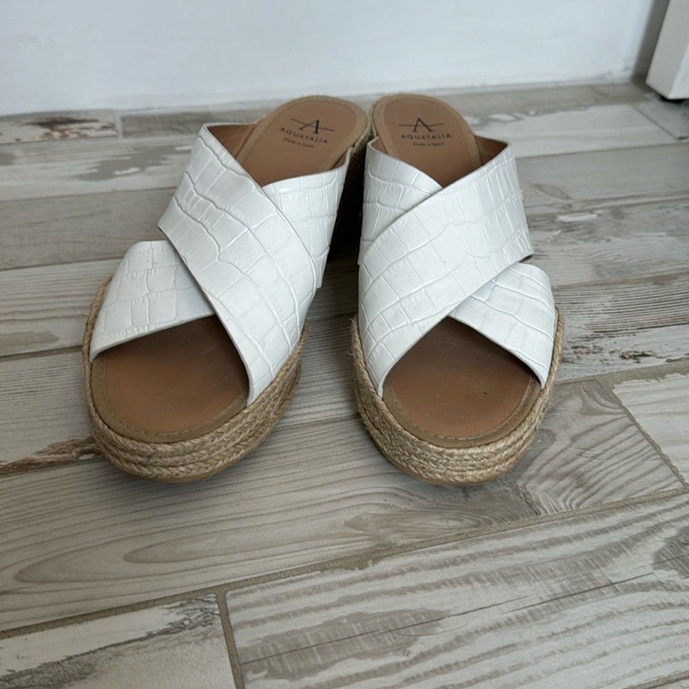 Women’s size 10 Aquatalia white mule. Gently worn. Good condition